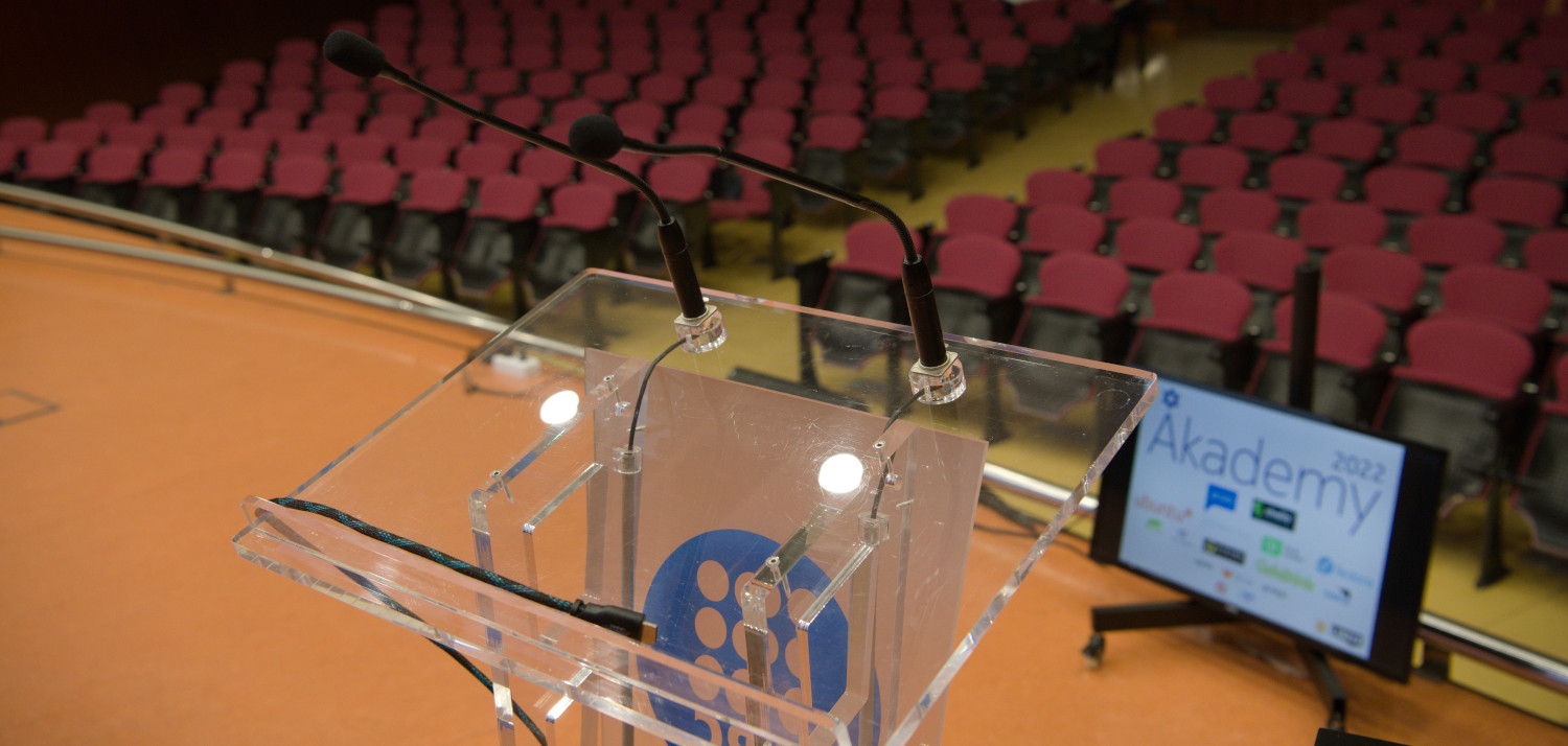 Akademy 2023 from the stage: lectern and teleprompter